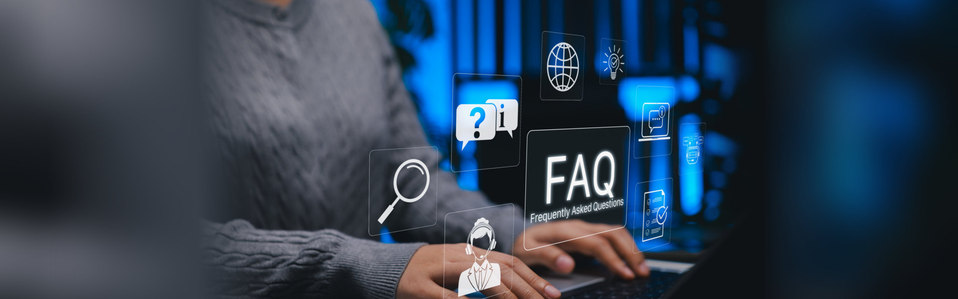 Person typing on a laptop with floating FAQ and Frequently Asked Questions icons